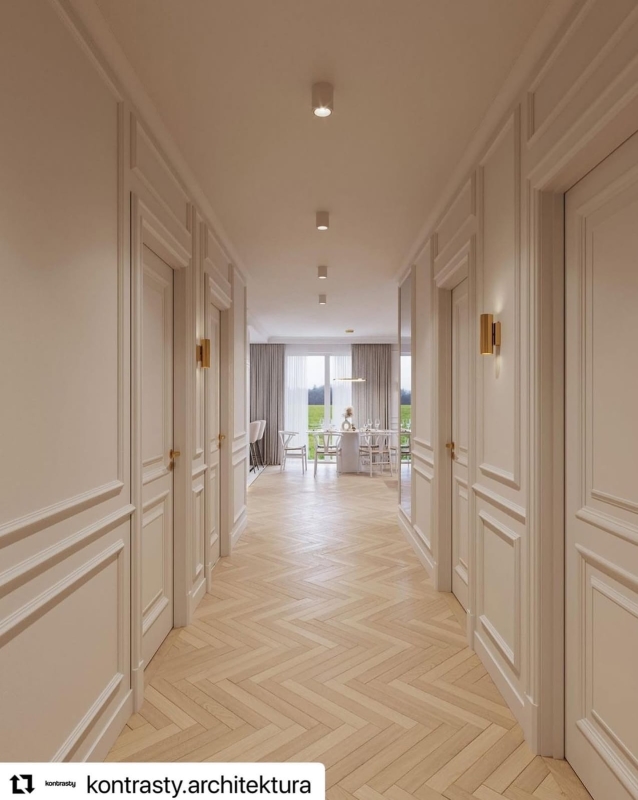 Minimalistyczny złoty kinkiet tuba w kolorze mosiądzu światło góra-dół MITOS - aranżacja.