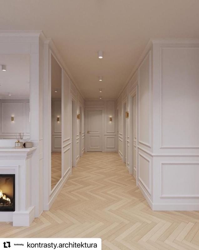 Minimalistyczny złoty kinkiet tuba w kolorze mosiądzu światło góra-dół MITOS - aranżacja.