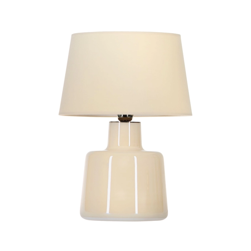 Kremowa lampa stołowa szklana SANTANA CREAM w białym kolorze z błyszczącą, waniliową powłoką z kremowym abażurem w kształcie stożka.